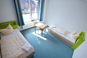 Übernachtung im Zweibettzimmer mit Dusche und WC